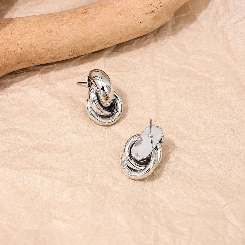 Sleek Knot, Subtle Shine — Elegant Single Earring