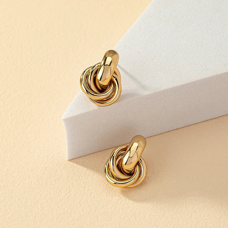 Sleek Knot, Subtle Shine — Elegant Single Earring